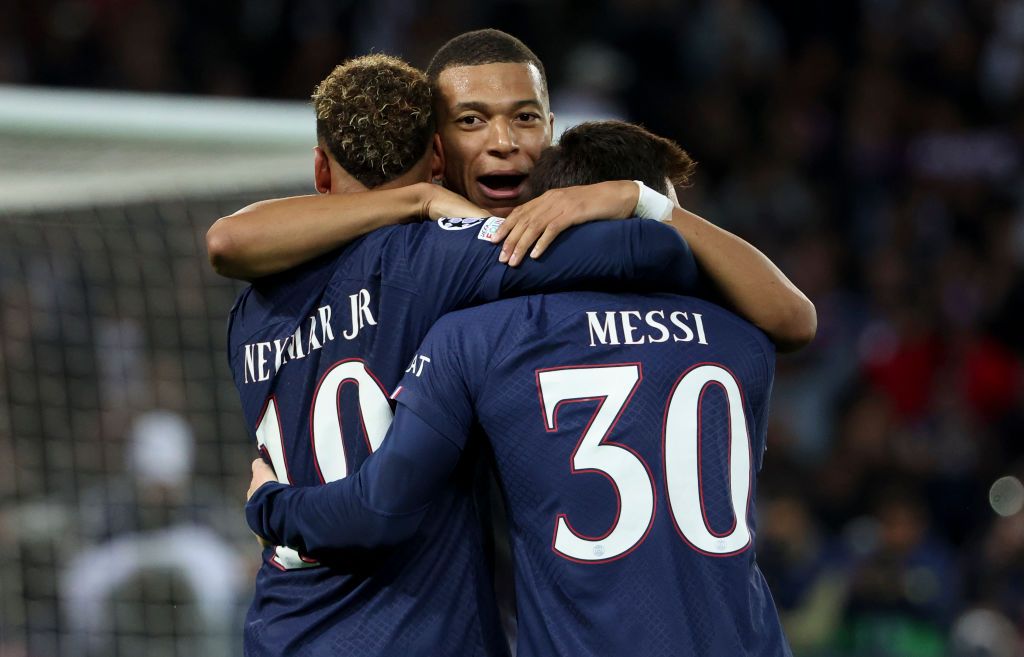 PARIS, FRANCE - OCTOBER 25: Neymar Jr of PSG celebrates his goal with Kylian Mbappe (left), Lionel Messi of PSG during the UEFA Champions League group H match between Paris Saint-Germain (PSG) and Maccabi Haifa FC at Parc des Princes stadium on October 25, 2022 in Paris, France. (Photo by Jean Catuffe/Getty Images)