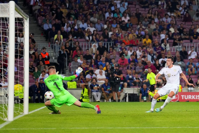 Barcelona vs Bayern Munich BARCELONA, SPAIN - OCTOBER 26: Benjamin Pavard of Bayern Munich scores their team's third goal during the UEFA Champions League group C match between FC Barcelona and FC Bayern MΓΌnchen at Spotify Camp Nou on October 26, 2022 in Barcelona, Spain. (Photo by Aitor Alcalde/Getty Images)