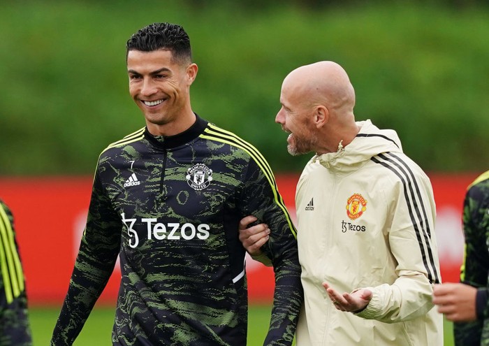 Manchester Uniteds Cristiano Ronaldo speaks to manager Erik ten Hag during a training session at the Aon Training Complex, Greater Manchester. Picture date: Wednesday September 14, 2022. (Photo by Martin Rickett/PA Images via Getty Images)