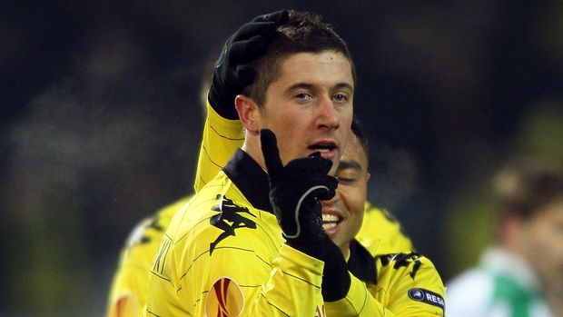 DORTMUND, GERMANY - DECEMBER 02: Robert Lewandowski of Dortmund celebrates the third goal  during the UEFA Europa League group J match between Borussia Dortmund and Karpaty Lviv at Signal Iduna Park on December 2, 2010 in Dortmund, Germany. (Photo by Christof Koepsel/Bongarts/Getty Images)