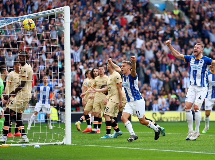 BRIGHTON, ENGLAND - OCTOBER 29: Leandro Trossard and Adam Webster of Brighton & Hove Albion celebrate after Ruben Loftus-Cheek of Chelsea (hidden) scored an own goal which leads to Brighton & Hove Albion's second goal during the Premier League match between Brighton & Hove Albion and Chelsea FC at American Express Community Stadium on October 29, 2022 in Brighton, England. (Photo by Bryn Lennon/Getty Images)