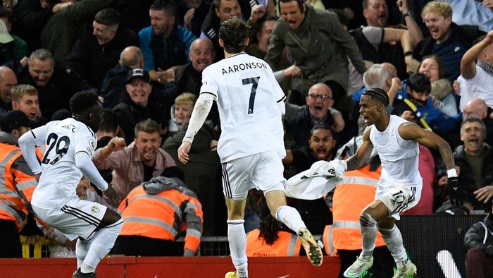 Leeds Uniteds Dutch striker Crysencio Summerville (R) celebrates scoring his teams second goal during the English Premier League football match between Liverpool and Leeds United at Anfield in Liverpool, north west England on October 29, 2022. - - RESTRICTED TO EDITORIAL USE. No use with unauthorized audio, video, data, fixture lists, club/league logos or live services. Online in-match use limited to 120 images. An additional 40 images may be used in extra time. No video emulation. Social media in-match use limited to 120 images. An additional 40 images may be used in extra time. No use in betting publications, games or single club/league/player publications. (Photo by Oli SCARFF / AFP) / RESTRICTED TO EDITORIAL USE. No use with unauthorized audio, video, data, fixture lists, club/league logos or live services. Online in-match use limited to 120 images. An additional 40 images may be used in extra time. No video emulation. Social media in-match use limited to 120 images. An additional 40 images may be used in extra time. No use in betting publications, games or single club/league/player publications. / RESTRICTED TO EDITORIAL USE. No use with unauthorized audio, video, data, fixture lists, club/league logos or live services. Online in-match use limited to 120 images. An additional 40 images may be used in extra time. No video emulation. Social media in-match use limited to 120 images. An additional 40 images may be used in extra time. No use in betting publications, games or single club/league/player publications. (Photo by OLI SCARFF/AFP via Getty Images)