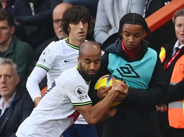 BOURNEMOUTH, ENGLAND - OCTOBER 29: Lucas of Tottenham Hotspur attempts to recover the ball from a ballboy during the Premier League match between AFC Bournemouth and Tottenham Hotspur at Vitality Stadium on October 29, 2022 in Bournemouth, England. (Photo by Dan Mullan/Getty Images)