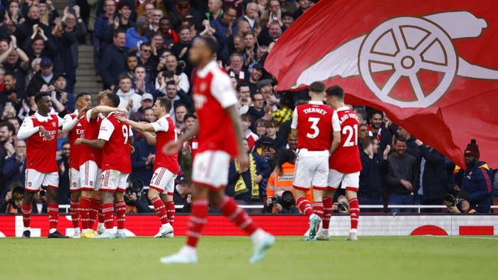 Arsenals Martin Odegaard celebrates after scoring his sides 5th goal during the English Premier League soccer match between, Arsenal and Nottingham Forrest at the Emirates stadium in London, Sunday, Oct. 30, 2022. (AP Photo/David Cliff)