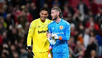 Kiper pengganti West Ham, Alphonse Areola, juga tak kalah mengapresiasi De Gea. Foto: PA Images via Getty Images/David Davies - PA Images