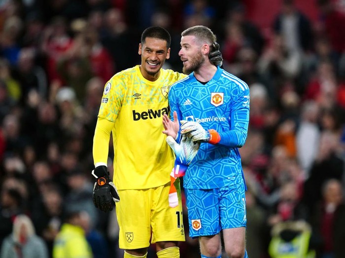 West Ham United's Alphonse Areola greets Manchester United goalkeeper David de Gea following the Premier League match at Old Trafford, Manchester. Picture date: Sunday October 30, 2022. (Photo by David Davies/PA Images via Getty Images)