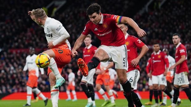 West Ham United's Jarrod Bowen and Manchester United's Harry Maguire battle for the ball during the Premier League match at Old Trafford, Manchester. Picture date: Sunday October 30, 2022. (Photo by David Davies/PA Images via Getty Images)