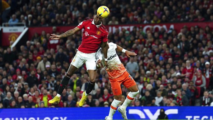 Marcus Rashford vs West Ham Manchester United's Marcus Rashford, top left, scores his side's opening goal during the English Premier League soccer match between Manchester United and West Ham United at Old Trafford stadium in Manchester, England, Sunday, Oct. 30, 2022. (David Davies/PA via AP)