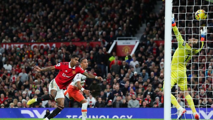Marcus Rashford vs West Ham MANCHESTER, ENGLAND - OCTOBER 30: Marcus Rashford of Manchester United scores his side's first goal during the Premier League match between Manchester United and West Ham United at Old Trafford on October 30, 2022 in Manchester, England. (Photo by James Gill - Danehouse/Getty Images)