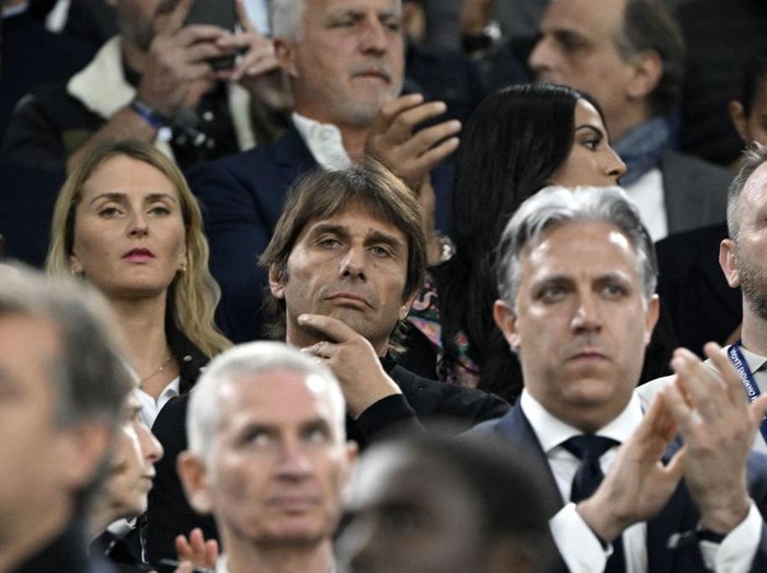 Tottenham's Italian head coach Antonio Conte (C) sits at the tribune to watch the UEFA Champions League group D football match between Olympique Marseille (OM) and Tottenham Hotspur at The Velodrome Stadium in Marseille, southern France on November 1, 2022. - Tottenham's Italian head coach Antonio Conte was shown a red card during the match with Sporting Lisbon on October 26, 2022 for his reaction after an injury time goal was disallowed. (Photo by Christophe SIMON / AFP) (Photo by CHRISTOPHE SIMON/AFP via Getty Images)
