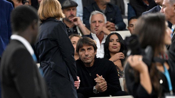Antonio Conte, Marseille vs Tottenham Tottenham's Italian head coach Antonio Conte (C) sits at the tribune to watch the UEFA Champions League group D football match between Olympique Marseille (OM) and Tottenham Hotspur at The Velodrome Stadium in Marseille, southern France on November 1, 2022. - Tottenham's Italian head coach Antonio Conte was shown a red card during the match with Sporting Lisbon on October 26, 2022 for his reaction after an injury time goal was disallowed. (Photo by Christophe SIMON / AFP) (Photo by CHRISTOPHE SIMON/AFP via Getty Images)