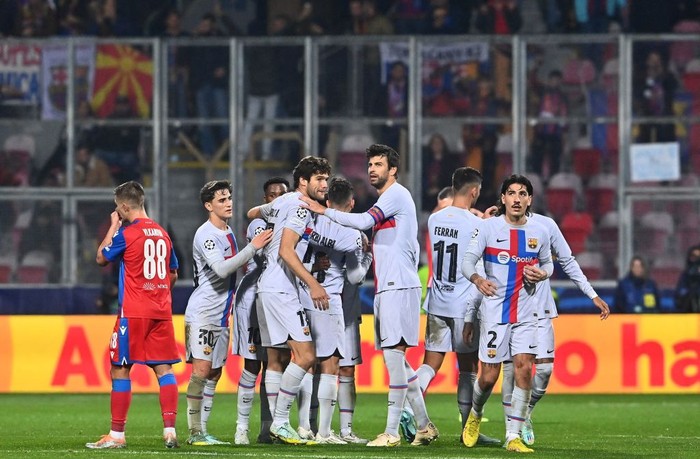 Barcelonas players celebrate after Barcelonas Spanish forward Ferran Torres (3R) scored the 2-0 goal during the UEFA Champions League Group C football match FC Viktoria Plzen v FC Barcelona in Plzen, Czech Republic, on November 1, 2022. (Photo by Michal Cizek / AFP) (Photo by MICHAL CIZEK/AFP via Getty Images)