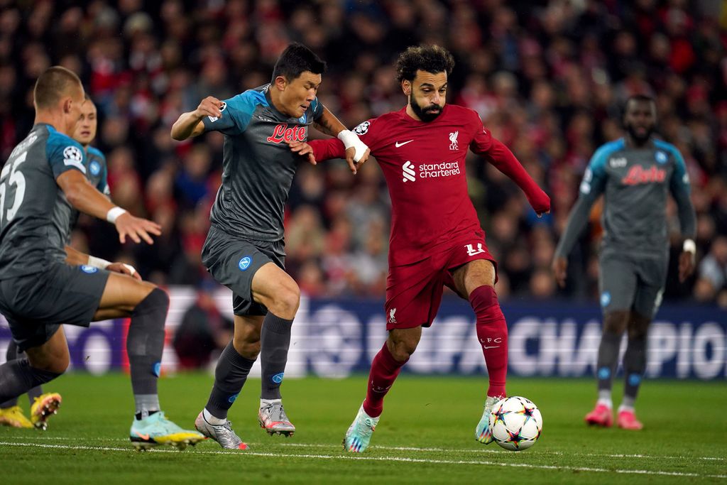 Liverpool's Mohamed Salah (right) and Napoli's Min-Jae Kim battle for the ball during the UEFA Champions League Group A match at Anfield, Liverpool. Picture date: Tuesday November 1, 2022. (Photo by Nick Potts/PA Images via Getty Images)