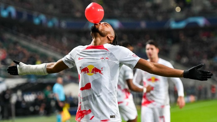 WARSAW, POLAND - NOVEMBER 02: Christopher Nkunku of RB Leipzig celebrates after scoring his team's first goal during the UEFA Champions League group F match between Shakhtar Donetsk and RB Leipzig at The Marshall Jozef Pilsudski's Municipal Stadium of Legia Warsaw on November 2, 2022 in Warsaw, Poland. (Photo by Mateusz Slodkowski/DeFodi Images via Getty Images)