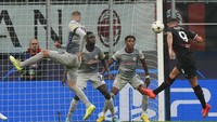 AC Milan yang hanya butuh hasil imbang untuk memastikan tiket ke 16 besar Liga Champions berhasil unggul cepat di menit ke-14 lewat Olivier Giroud. AP/Luca Bruno