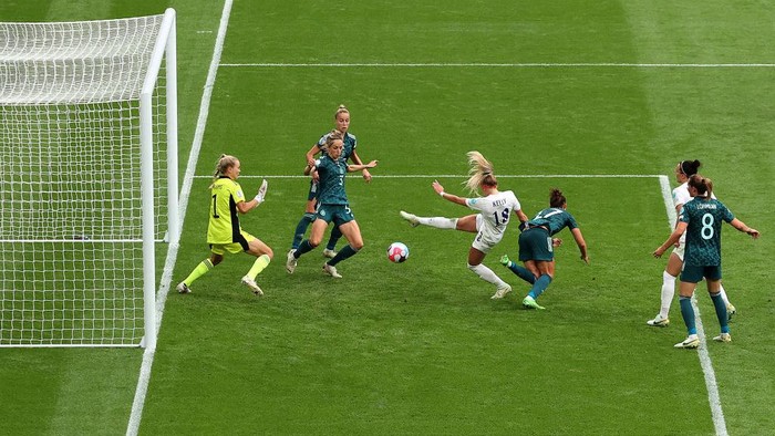 LONDON, ENGLAND - JULY 31:   Chloe Kelly of England scores their teams second goal during the UEFA Womens Euro 2022 final match between England and Germany at Wembley Stadium on July 31, 2022 in London, England. (Photo by Julian Finney - The FA/The FA via Getty Images)