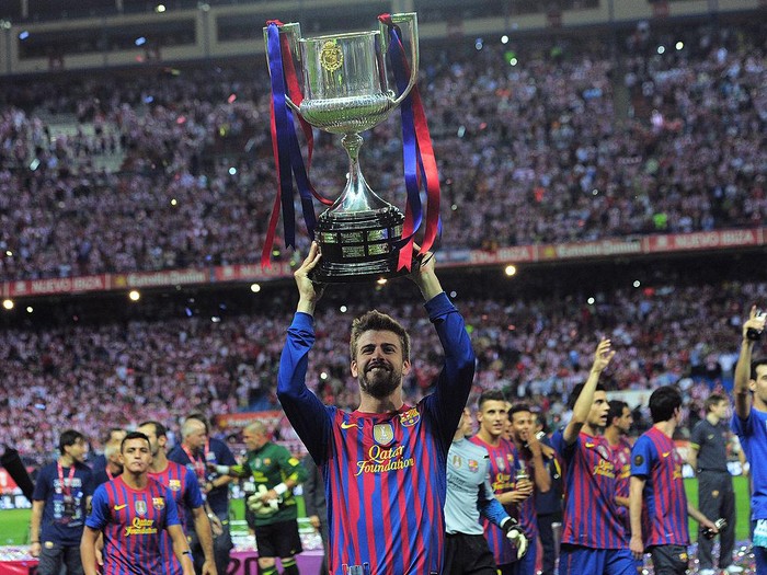 Gerard Pique lifts the league champion trophy after Barcelona won their 26th league title at the end of the Spanish League football match between Barcelona and Levante at the Camp Nou stadium in Barcelona on April 27, 2019
 (Photo by Jose Breton/NurPhoto via Getty Images)