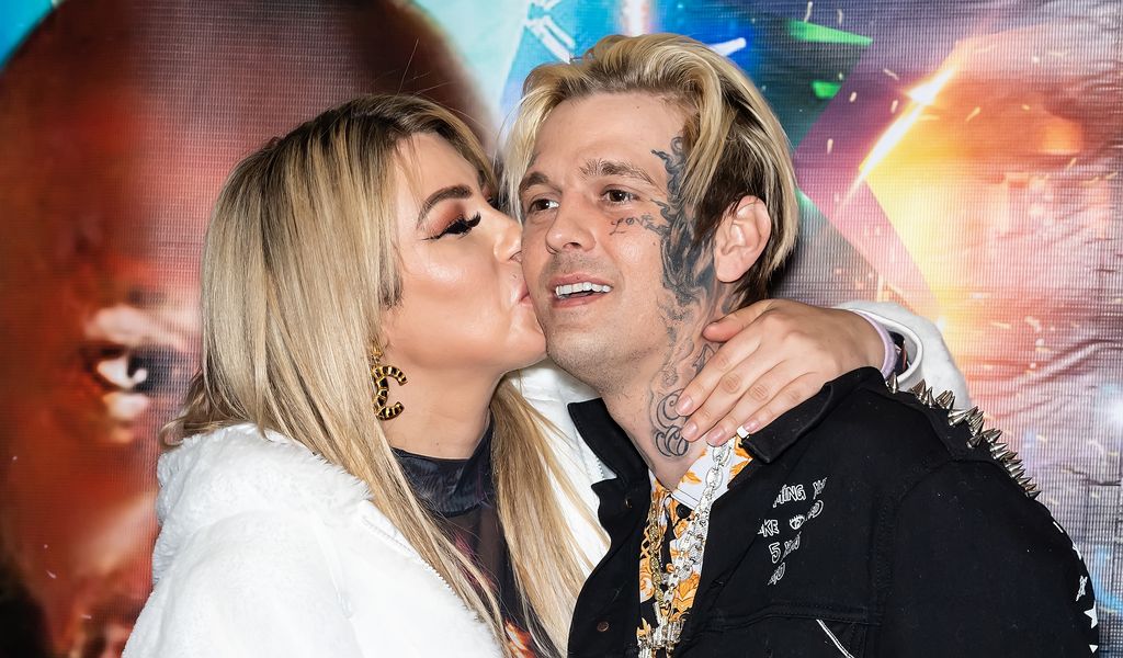 1311590311 PHILADELPHIA, PENNSYLVANIA - APRIL 08: Aaron Carter (R) and his fiancée Melanie Martin are seen arriving to Philadelphia International Airport for his upcoming Celebrity Boxing Face Off between Lamar Odom & Aaron Carter on April 08, 2021 in Philadelphia, Pennsylvania. (Photo by Gilbert Carrasquillo/GC Images)