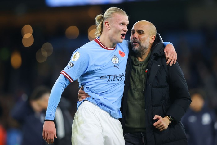MANCHESTER, ENGLAND - NOVEMBER 05: Erling Haaland of Manchester City celebrates with Josep Pep Guardiola, manager of Manchester City, after the Premier League match between Manchester City and Fulham FC at Etihad Stadium on November 05, 2022 in Manchester, England. (Photo by James Gill - Danehouse/Getty Images)