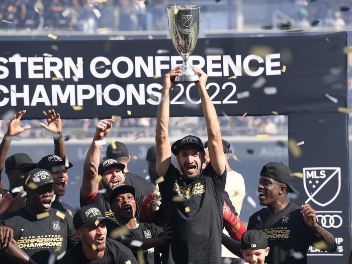 LOS ANGELES, CA - OCTOBER 30: Giorgio Chiellini #14 of Los Angeles FC holds the championship trophy as he celebrates with teammates after defeating Austin FC, 3-0, during the Western Conference Finals of the 2022 MLS Cup Playoffs at Banc of California Stadium on October 30, 2022 in Los Angeles, California. (Photo by Kevork Djansezian/Getty Images)