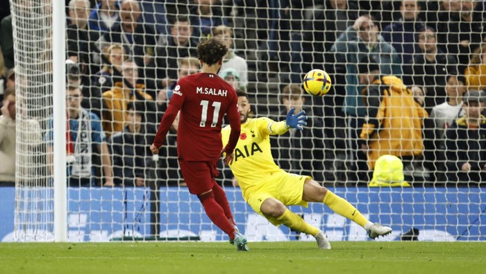 Liverpools Mohamed Salah scores his sides second goal during the English Premier League soccer match between Tottenham Hotspur and Liverpool at Tottenham Hotspur Stadium, in London, Sunday, Nov. 6, 2022. (AP Photo/David Cliff)