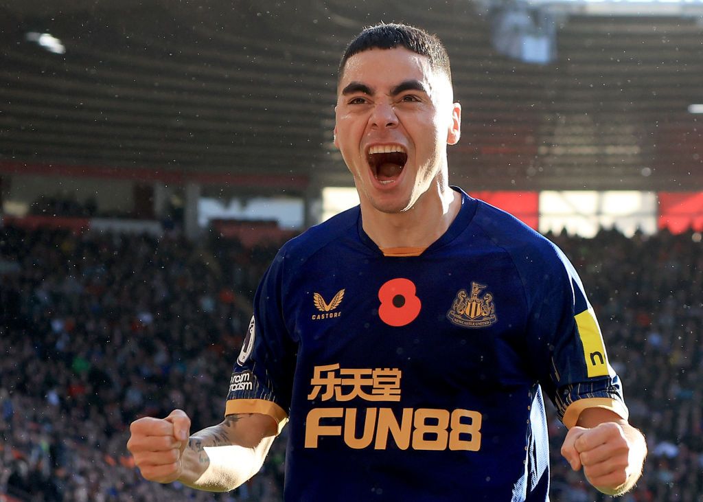 NEWCASTLE UPON TYNE, ENGLAND - OCTOBER 29: Miguel Almiron of Newcastle United celebrates after scoring their side's fourth goal with Callum Wilson during the Premier League match between Newcastle United and Aston Villa at St. James Park on October 29, 2022 in Newcastle upon Tyne, England. (Photo by Stu Forster/Getty Images)