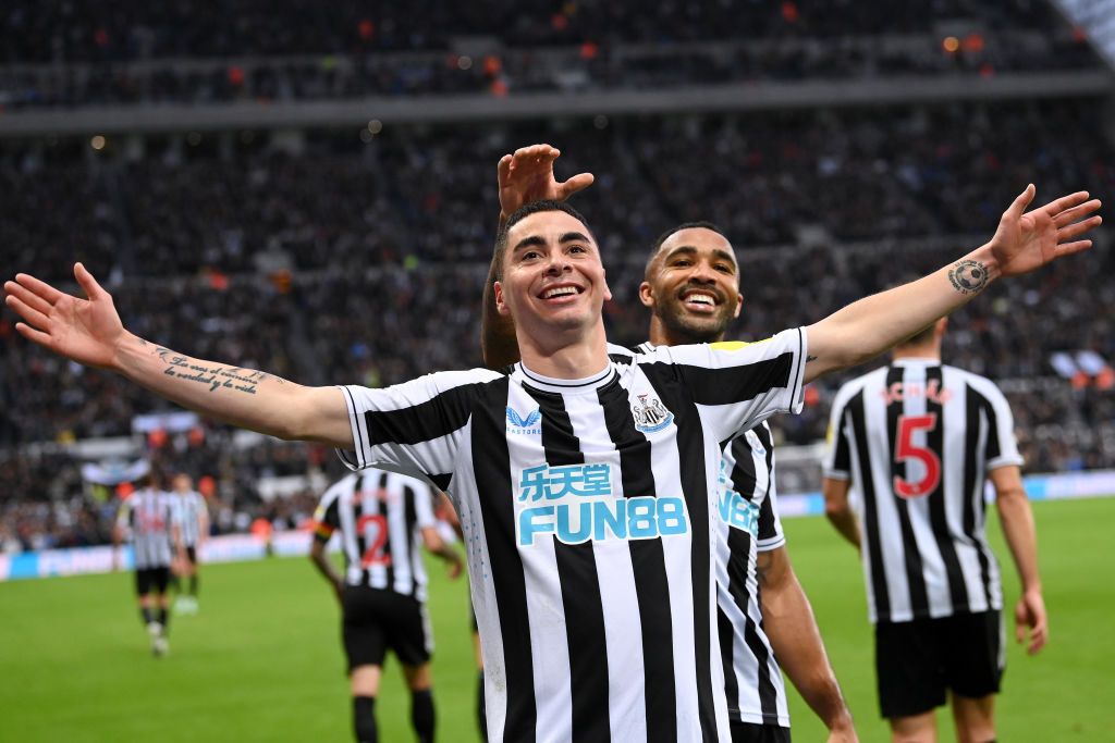 NEWCASTLE UPON TYNE, ENGLAND - OCTOBER 29: Miguel Almiron of Newcastle United celebrates after scoring their side's fourth goal with Callum Wilson during the Premier League match between Newcastle United and Aston Villa at St. James Park on October 29, 2022 in Newcastle upon Tyne, England. (Photo by Stu Forster/Getty Images)