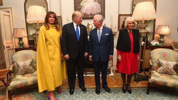 Britain's Prince Charles, Prince of Wales (2nd R) and Britain's Camilla, Duchess of Cornwall (R) meet US President Donald Trump (2nd L) and US First Lady Melania Trump (L) pose for a photograph at Clarence House in central London on December 3, 2019, ahead of the NATO alliance summit. - NATO leaders gather Tuesday for a summit to mark the alliance's 70th anniversary but with leaders feuding and name-calling over money and strategy, the mood is far from festive. (Photo by Victoria Jones / POOL / AFP) (Photo by VICTORIA JONES/POOL/AFP via Getty Images)