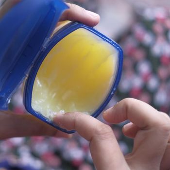 top view of young women use Vaseline for caring health