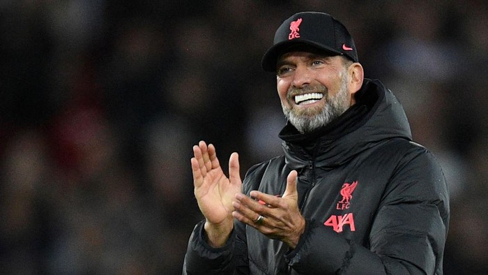 Liverpools German manager Jurgen Klopp celebrates after the final whistle of the English League Cup third round football match between Liverpool and Derby County at Anfield in Liverpool, north west England on November 9, 2022. - - RESTRICTED TO EDITORIAL USE. No use with unauthorized audio, video, data, fixture lists, club/league logos or live services. Online in-match use limited to 120 images. An additional 40 images may be used in extra time. No video emulation. Social media in-match use limited to 120 images. An additional 40 images may be used in extra time. No use in betting publications, games or single club/league/player publications. (Photo by Oli SCARFF / AFP) / RESTRICTED TO EDITORIAL USE. No use with unauthorized audio, video, data, fixture lists, club/league logos or live services. Online in-match use limited to 120 images. An additional 40 images may be used in extra time. No video emulation. Social media in-match use limited to 120 images. An additional 40 images may be used in extra time. No use in betting publications, games or single club/league/player publications. / RESTRICTED TO EDITORIAL USE. No use with unauthorized audio, video, data, fixture lists, club/league logos or live services. Online in-match use limited to 120 images. An additional 40 images may be used in extra time. No video emulation. Social media in-match use limited to 120 images. An additional 40 images may be used in extra time. No use in betting publications, games or single club/league/player publications. (Photo by OLI SCARFF/AFP via Getty Images)