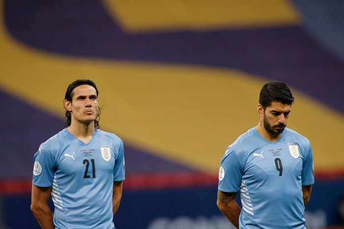 Uruguays Luis Suarez (R) and Edinson Cavani before the Conmebol 2021 Copa America football tournament quarter-final match against Colombia, at the Mane Garrincha Stadium in Brasilia, Brazil, on July 3, 2021. (Photo by SILVIO AVILA / AFP) (Photo by SILVIO AVILA/AFP via Getty Images)