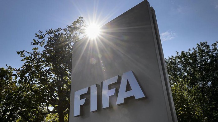 A sign of the FIFA is seen at the entrance of the footballs world body on July 20, 2015 in Zurich. FIFA leaders met July 20 to decide a date for an election to replace president Sepp Blatter and reform steps as footballs world body confronts its biggest corruption crisis.  AFP PHOTO / FABRICE COFFRINI(Photo credit should read FABRICE COFFRINI/AFP via Getty Images)