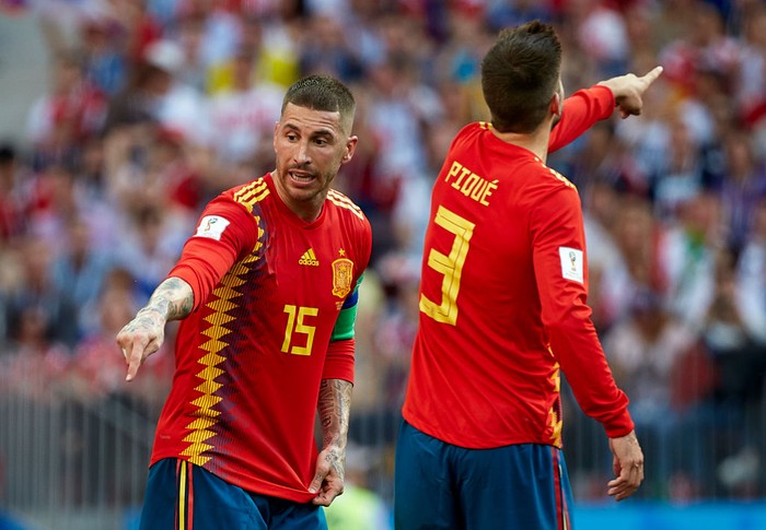 Sergio Ramos, Gerard Pique Spain's Gerard Pique celebrates scoring his side's first goal of the game with teammate Sergio Ramos (left)