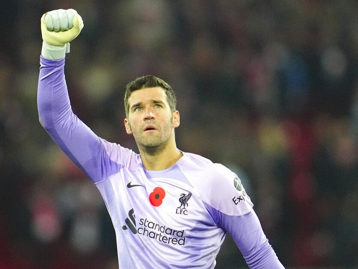 Liverpool's goalkeeper Alisson reacts after the English Premier League soccer match between Liverpool and Southampton at Anfield stadium in Liverpool, England, Saturday, Nov. 12, 2022. (AP Photo/Jon Super)