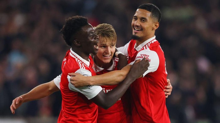 WOLVERHAMPTON, ENGLAND - NOVEMBER 12: Martin Odegaard of Arsenal celebrates with teammates after scoring his sides first goal during the Premier League match between Wolverhampton Wanderers and Arsenal FC at Molineux on November 12, 2022 in Wolverhampton, England. (Photo by James Gill - Danehouse/Getty Images)