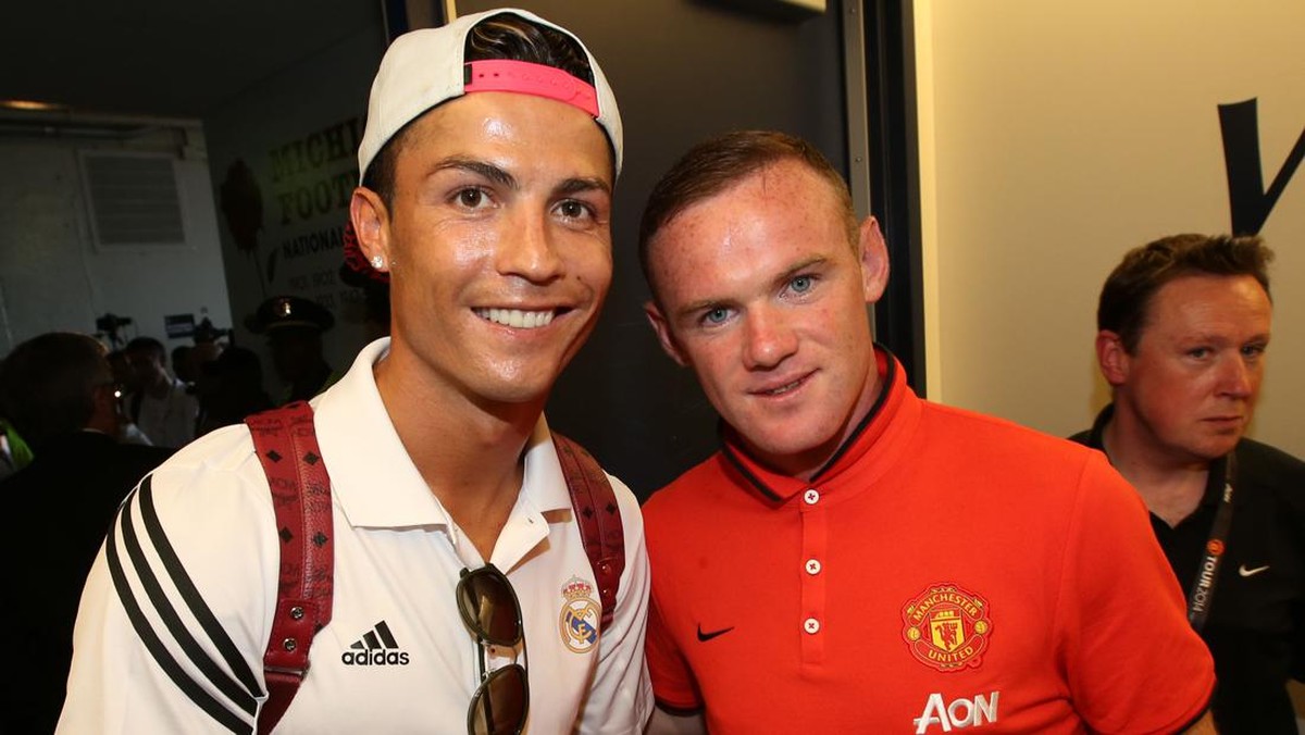 Cristiano Ronaldo dan Wayne Rooney. (Foto: Manchester United via Getty Imag/John Peters)