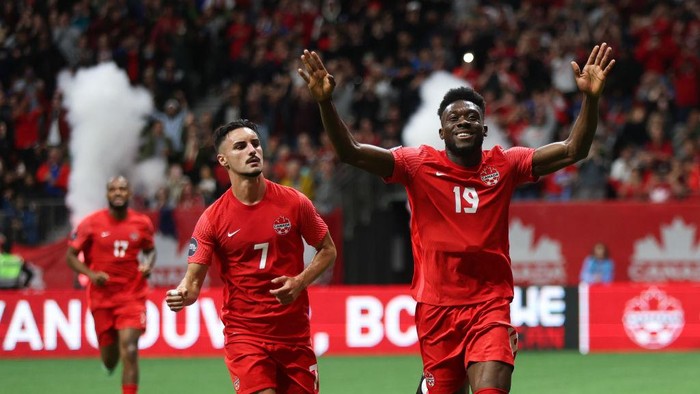 VANCOUVER, BC - JUNE 09: Alphonso Davies of Canada celebrates after scoring a goal to make it 1-0 during the Canada v Curacao CONCACAF Nations League Group C match at BC Place on June 9, 2022 in Vancouver, Canada. (Photo by Matthew Ashton - AMA/Getty Images)