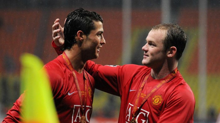 MOSCOW, RUSSIA - MAY 21: Cristiano Ronaldo and Wayne Rooney of Manchester United celebrate after the UEFA Champions League final between Manchester United and Chelsea at the Luzhniki Stadium on May 21, 2008 in Moscow, Russia. (Photo by Etsuo Hara/Getty Images)