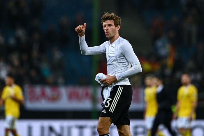HAMBURG, GERMANY - OCTOBER 08: Thomas Mueller of Germany celebrates after the 2022 FIFA World Cup Qualifier match between Germany and Romania at Imtech Arena on October 08, 2021 in Hamburg, Hamburg. (Photo by Markus Gilliar/Getty Images)