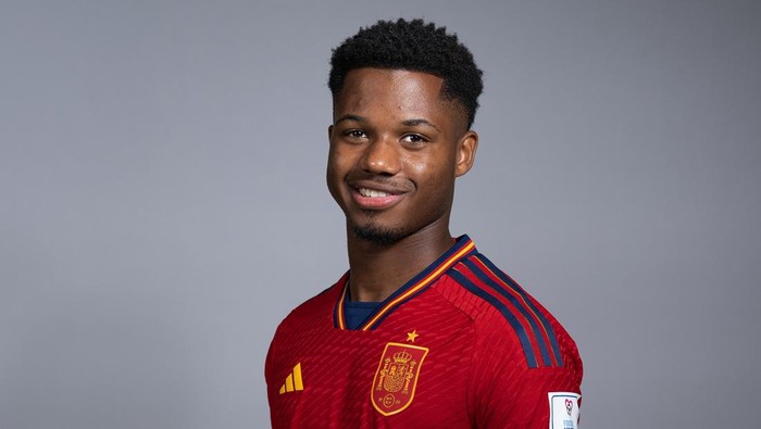 DOHA, QATAR - NOVEMBER 18: Ansu Fati of Spain poses during the official FIFA World Cup Qatar 2022 portrait session on November 18, 2022 in Doha, Qatar. (Photo by Alex Caparros - FIFA/FIFA via Getty Images)