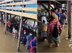 Warga Sarawak Rela Mengantre di Tengah Genangan Banjir Demi Memilih