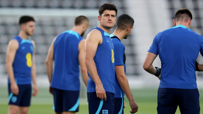 DOHA, QATAR - NOVEMBER 16: Harry Maguire looks on during the England training session at Al Wakrah Stadium on November 16, 2022 in Doha, Qatar. (Photo by Lars Baron/Getty Images)