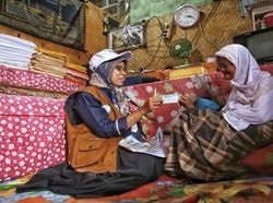 Kader JKN Bantu Warga di Padang Bayar Tunggakan Iuran