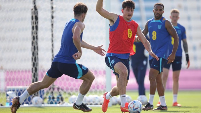 DOHA, QATAR - NOVEMBER 18: Harry Maguire of England in action during an England training session at Al Wakrah Stadium on November 18, 2022 in Doha, Qatar. (Photo by Eddie Keogh - The FA/The FA via Getty Images)