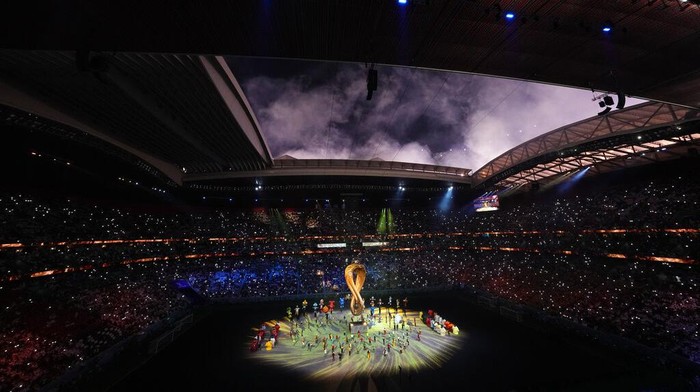 Actors perform during the opening ceremony before the World Cup, group A soccer match between Qatar and Ecuador at the Al Bayt Stadium in Al Khor, Qatar, Sunday, Nov. 20, 2022. (AP Photo/Hassan Ammar)