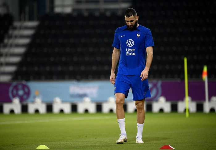Karim Benzema France's forward Karim Benzema looks down during a training session at the Jassim-bin-Hamad Stadium in Doha on November 17, 2022, ahead of the Qatar 2022 World Cup football tournament. (Photo by FRANCK FIFE / AFP) (Photo by FRANCK FIFE/AFP via Getty Images)