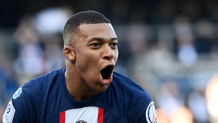 Paris Saint-Germains French forward Kylian Mbappe celebrates after scoring his goal during the French L1 football match between Paris Saint-Germain FC and AJ Auxerre at the Parc des Princes stadium in Paris on November 13, 2022. (Photo by FRANCK FIFE / AFP) (Photo by FRANCK FIFE/AFP via Getty Images)