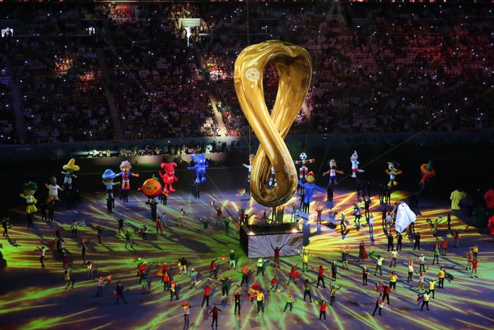 AL KHOR, QATAR - NOVEMBER 20: A general view of the opening ceremony as dancers and a giant Qatar 2022 logo is seen ahead of the FIFA World Cup Qatar 2022 Group A match between Qatar and Ecuador at Al Bayt Stadium on November 20, 2022 in Al Khor, Qatar. (Photo by Robbie Jay Barratt - AMA/Getty Images)