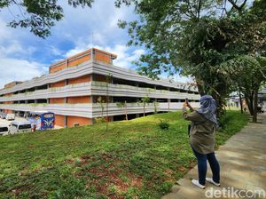 Penampakan Gedung Parkir Terpusat yang Bikin TMII Adem Penampakan Gedung Parkir Terpusat yang Bikin TMII Adem