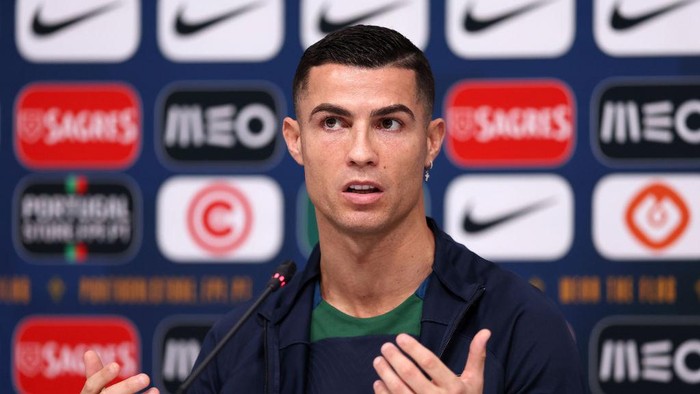 DOHA, QATAR - NOVEMBER 21: Cristiano Ronaldo of Portugal reacts during the Portugal Press Conference on November 21, 2022 in Doha, Qatar. (Photo by Christopher Lee/Getty Images )